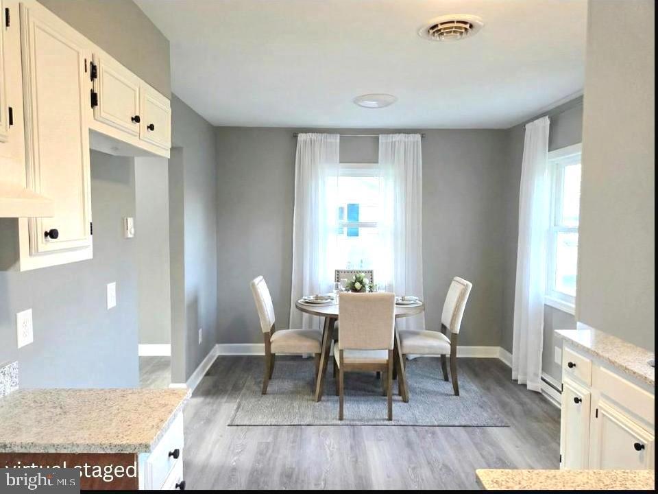 105 Goodwill Avenue Secretary, MD 21664 - Photo 7 of 22 Kitchen into Dining-virtual staged
