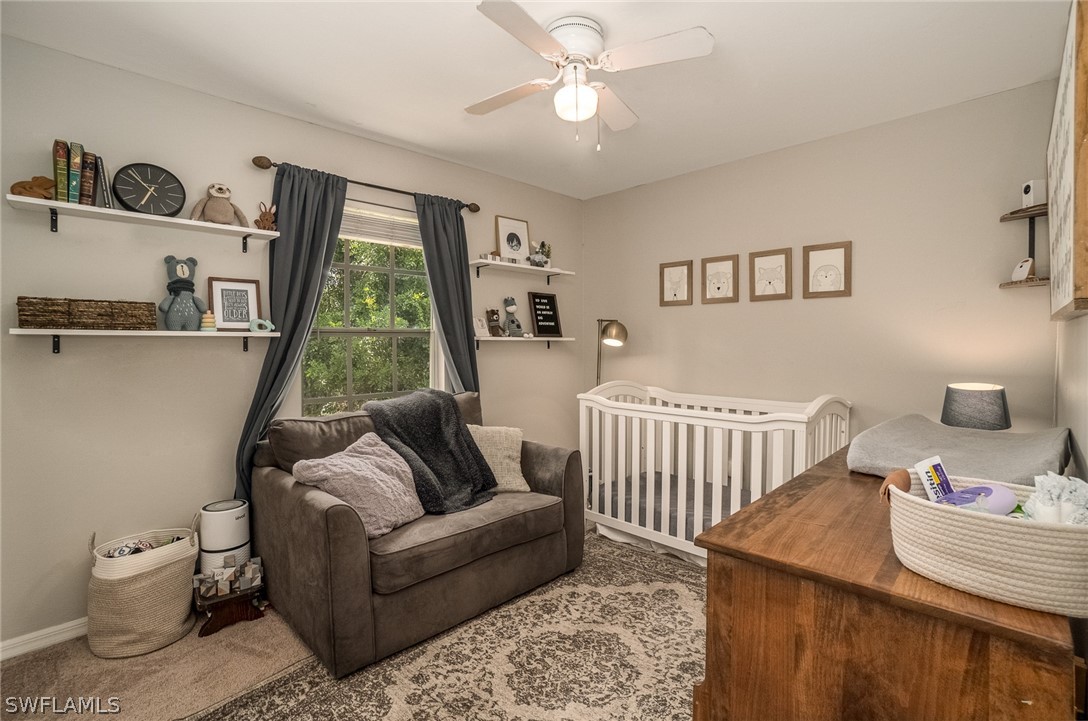 18210 Oak Road Fort Myers, FL 33967 - Photo 11 of 23 a living room with furniture and a window