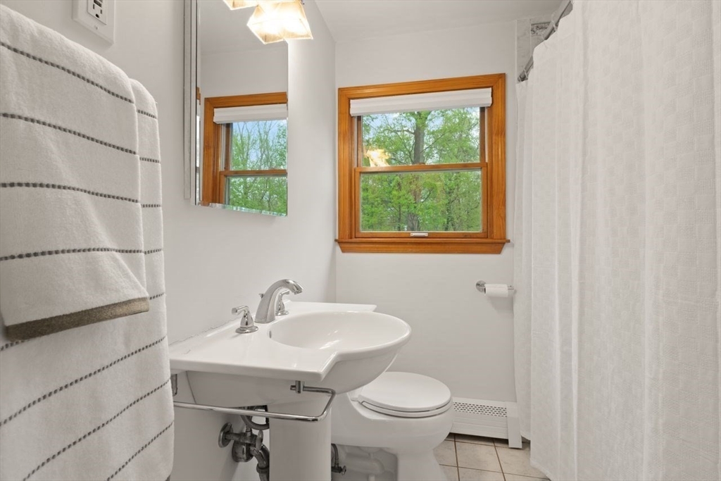 23 Gabriel Road Sharon, MA 02067 - Photo 22 of 41 a bathroom with a sink toilet and a mirror