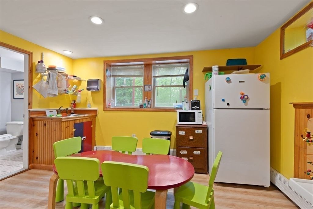 23 Gabriel Road Sharon, MA 02067 - Photo 25 of 41 a view of a dining room with furniture and a window