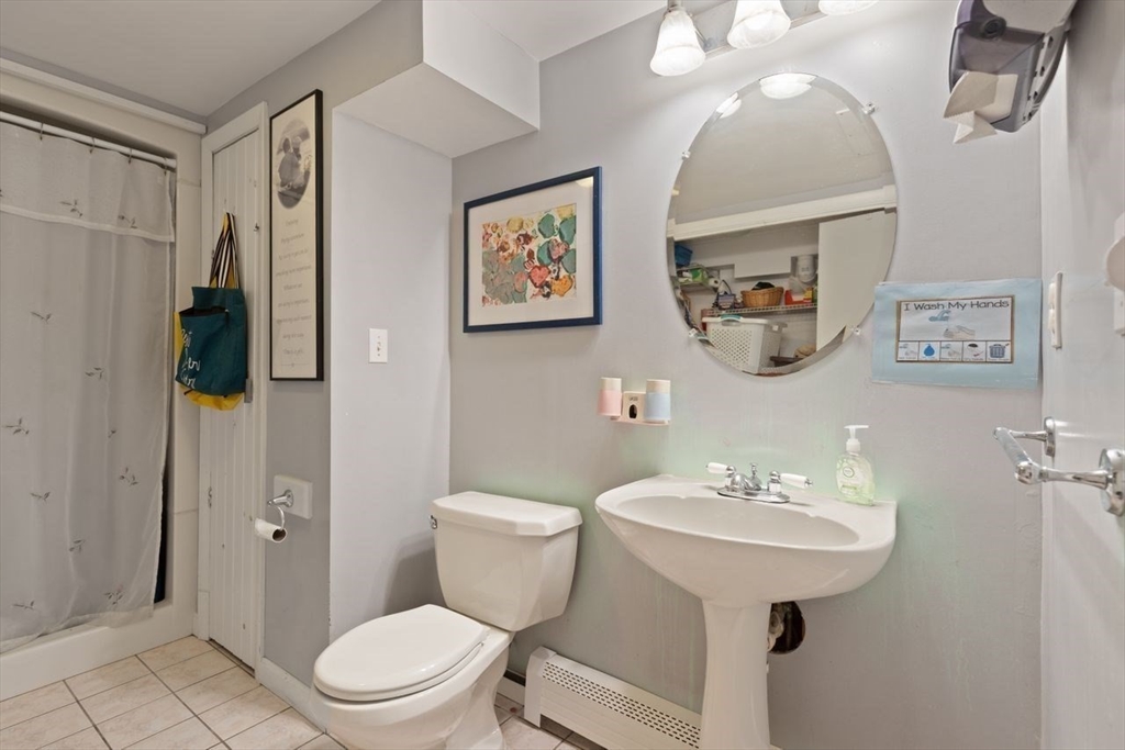 23 Gabriel Road Sharon, MA 02067 - Photo 29 of 41 a bathroom with a sink toilet and shower