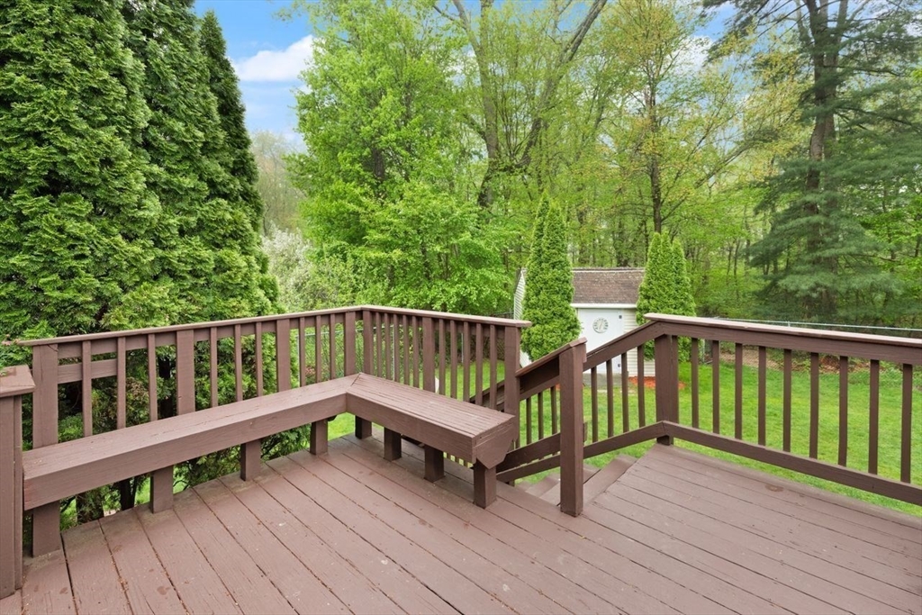 23 Gabriel Road Sharon, MA 02067 - Photo 31 of 41 a view of a wooden deck with chairs
