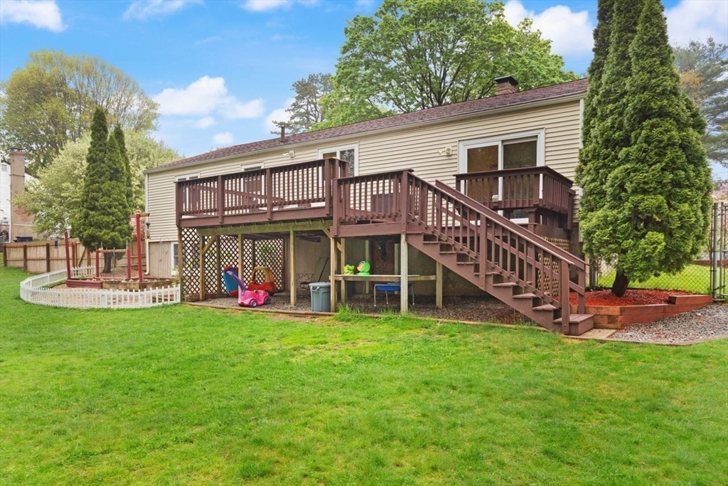 23 Gabriel Road Sharon, MA 02067 - Photo 36 of 41 a view of a house with a yard and sitting area