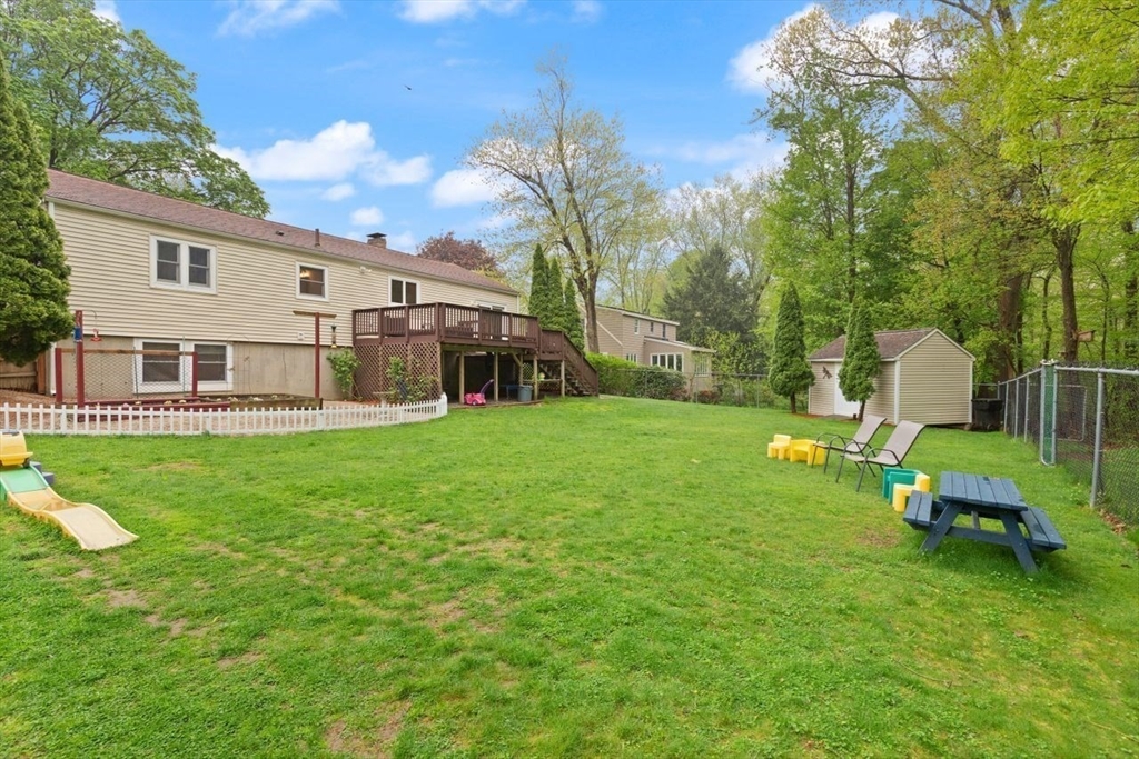 23 Gabriel Road Sharon, MA 02067 - Photo 37 of 41 a view of a house with a backyard porch and sitting area