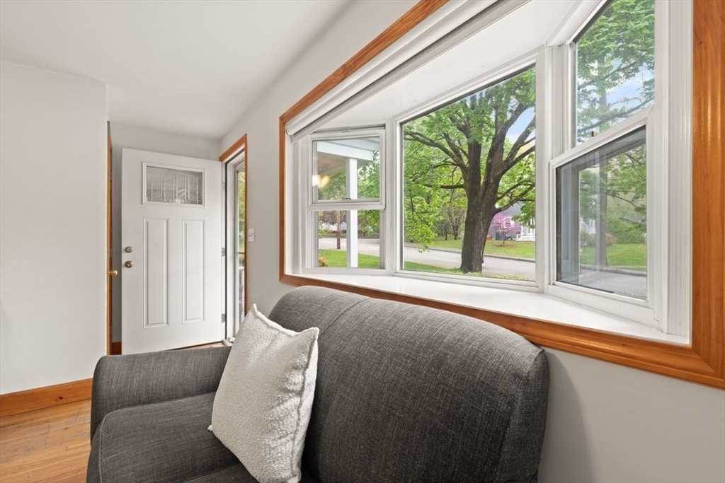 23 Gabriel Road Sharon, MA 02067 - Photo 6 of 41 a living room filled with couches and a large window