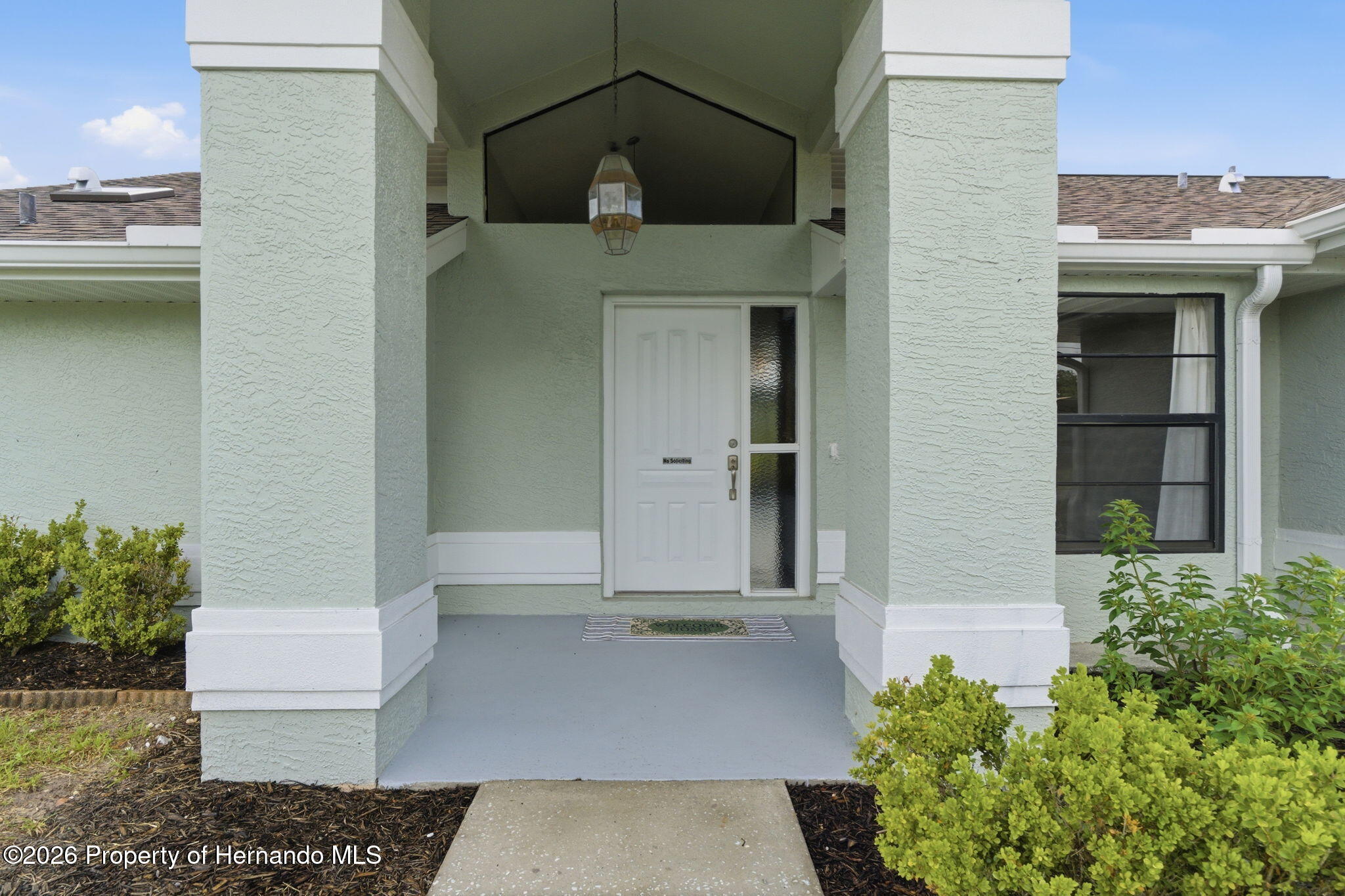 4966 Keysville Avenue Spring Hill, FL 34608 - Photo 4 of 50 a view of a entryway door of the house