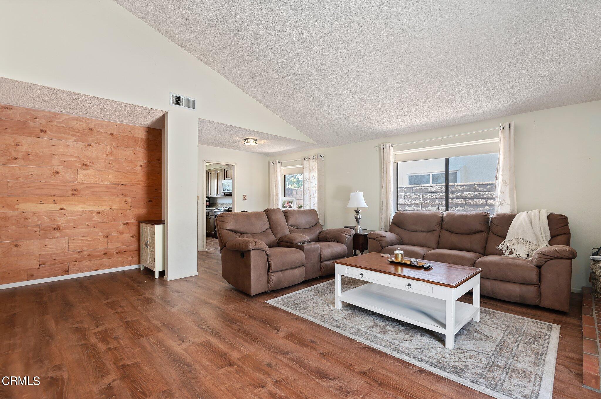 3041 Jacktar Avenue Oxnard, CA 93035 - Photo 6 of 19 a living room with furniture and a window