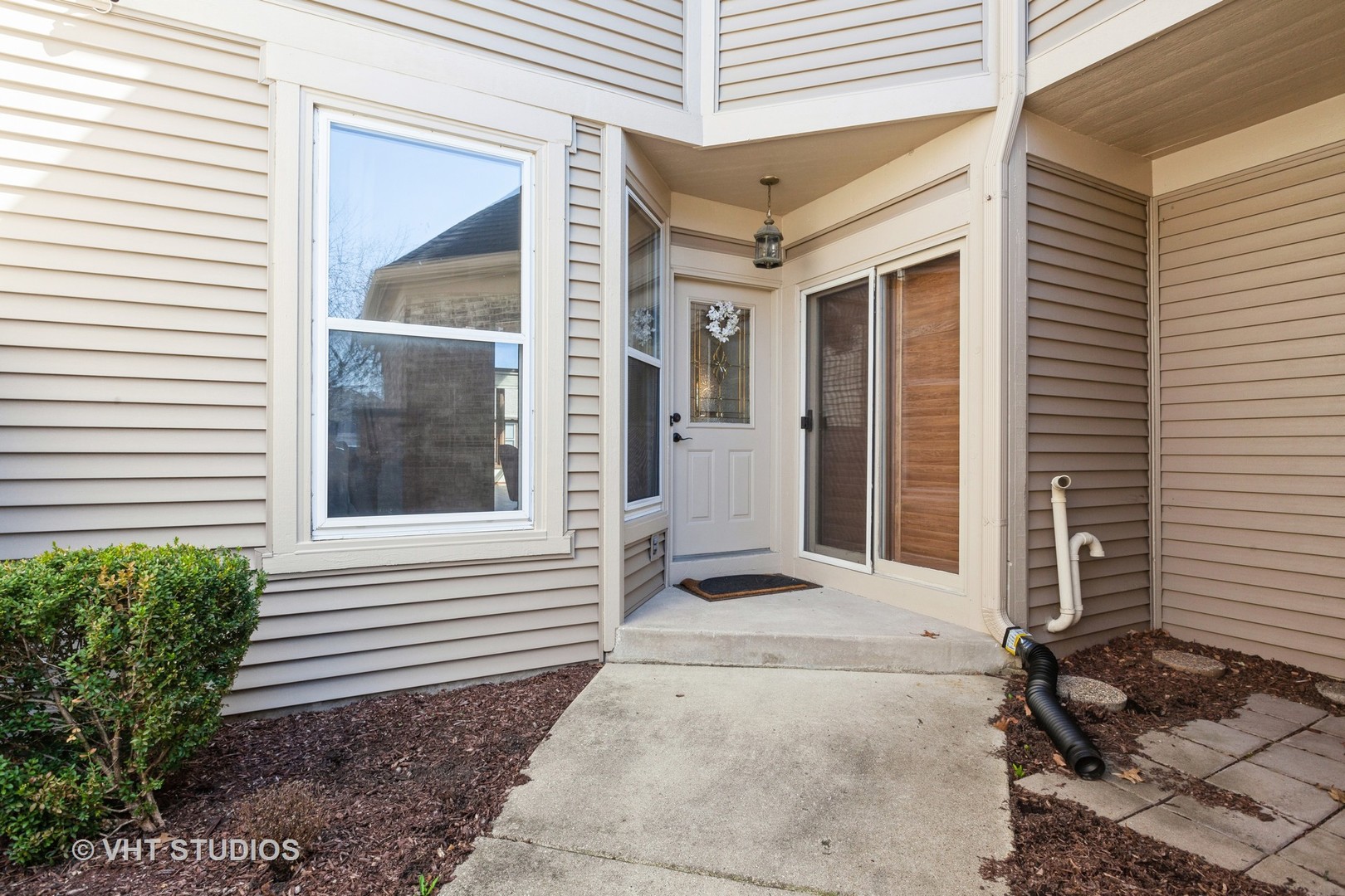 a front view of a house with a garage