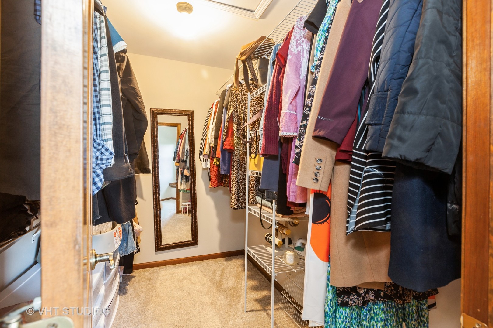 960 Heathrow Lane Naperville, IL 60540 - Photo 12 of 24 a view of walk in closet with clothes and shoes
