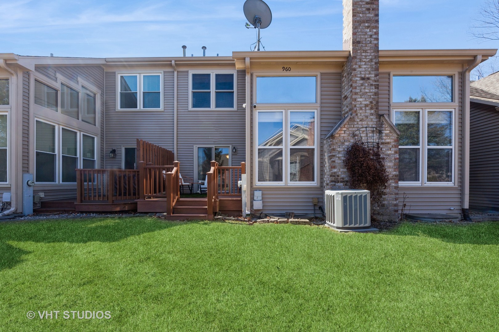 960 Heathrow Lane Naperville, IL 60540 - Photo 20 of 24 a view of a house with a yard and sitting area