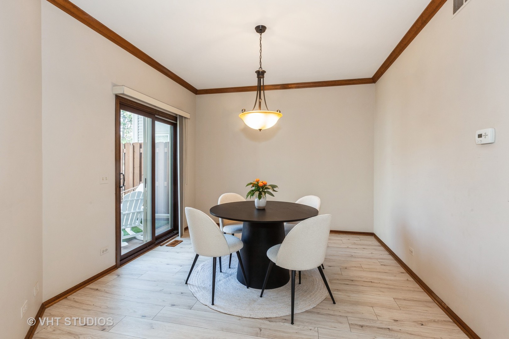960 Heathrow Lane Naperville, IL 60540 - Photo 7 of 24 a dining room with furniture and wooden floor