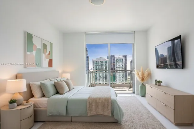 a hallway with a large window in a kitchen