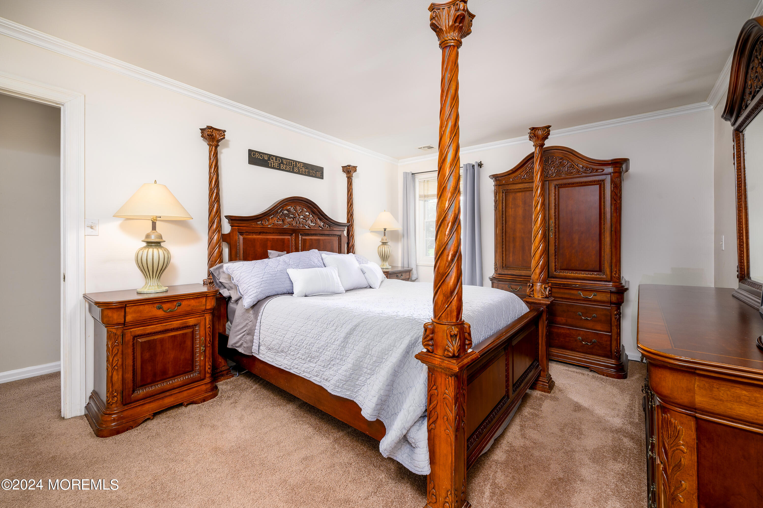 28 Chestnut Hill Road Howell, NJ 07731 - Photo 15 of 48 a bed room with a bed and a painting on the wall