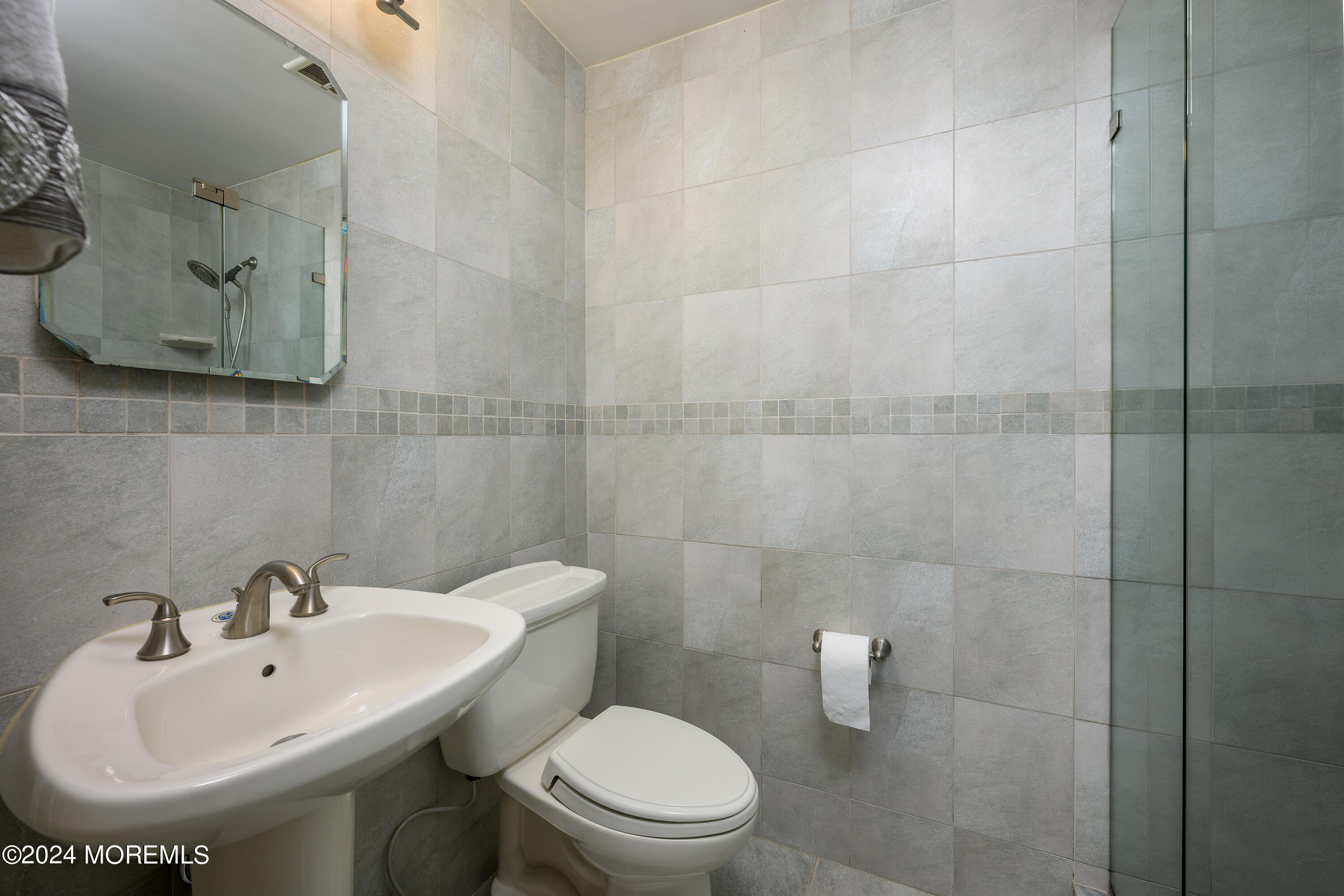 28 Chestnut Hill Road Howell, NJ 07731 - Photo 28 of 48 a bathroom with a sink toilet and shower