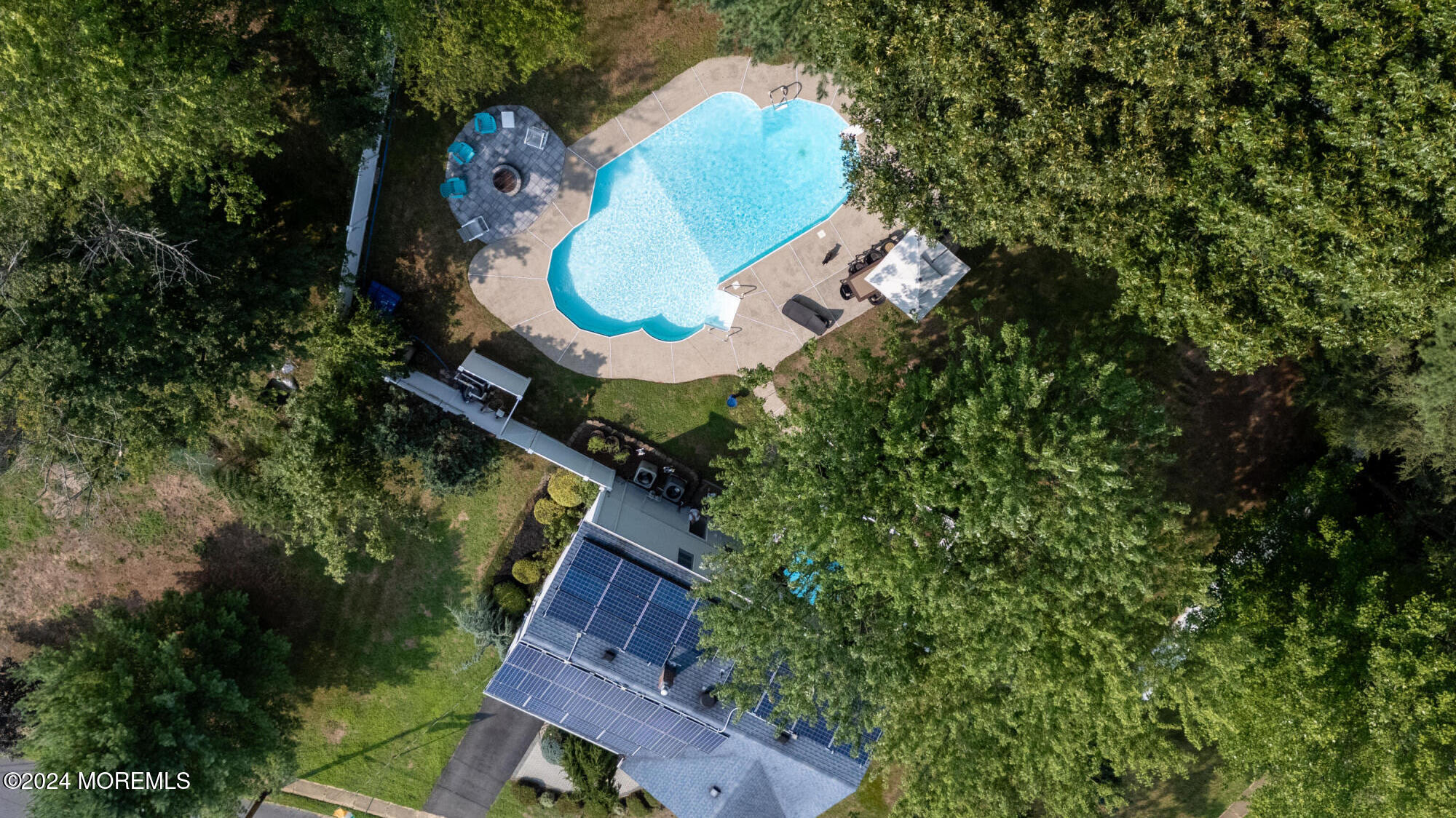 28 Chestnut Hill Road Howell, NJ 07731 - Photo 48 of 48 an aerial view of a house with a garden and swimming pool