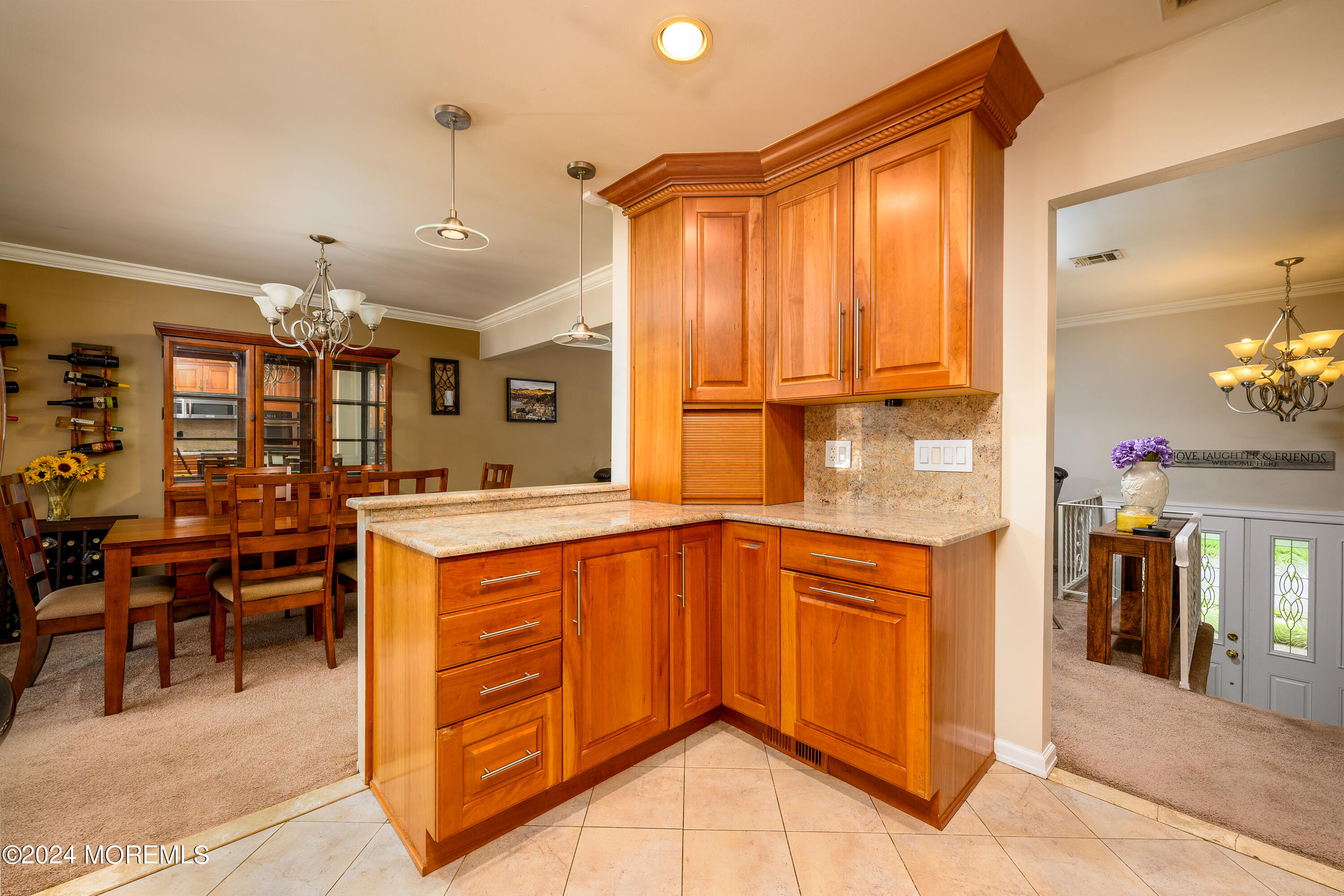 28 Chestnut Hill Road Howell, NJ 07731 - Photo 8 of 48 a kitchen with stainless steel appliances granite countertop a stove and a refrigerator