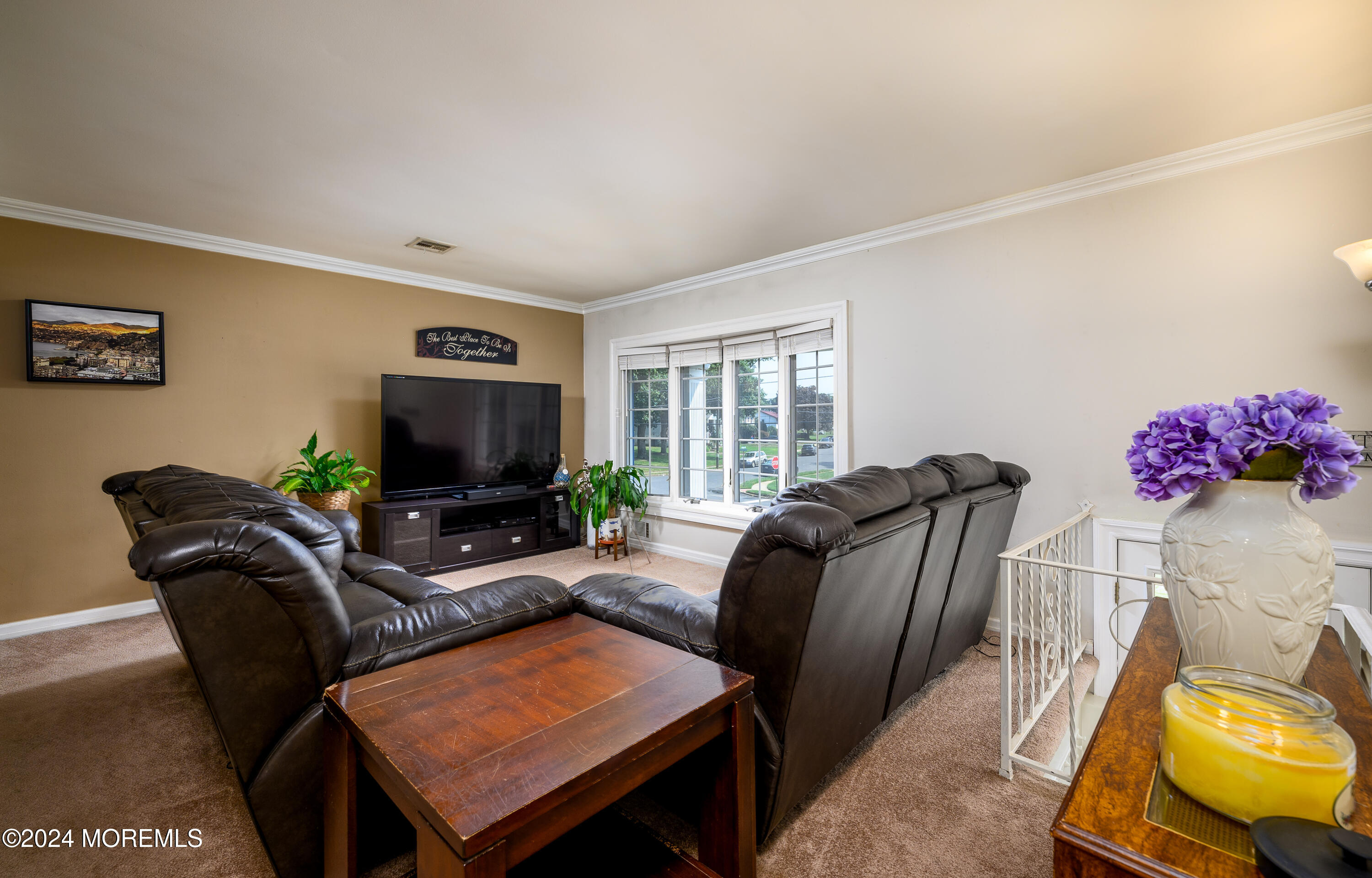 28 Chestnut Hill Road Howell, NJ 07731 - Photo 10 of 48 a living room with furniture and a flat screen tv