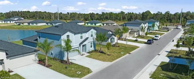 a view of a house with outdoor space and sitting area