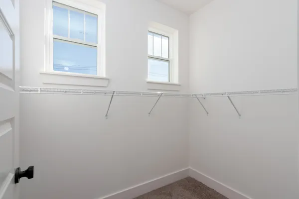 a view of an empty walk in closet