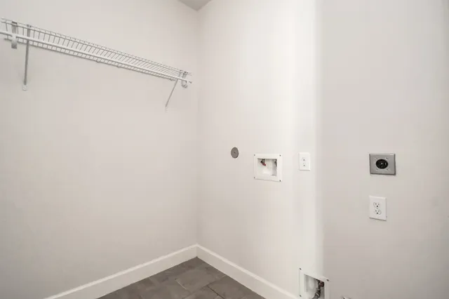 a view of small space with racks on the wall