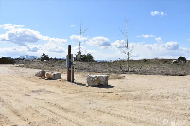 a view of lake with mountain in the back
