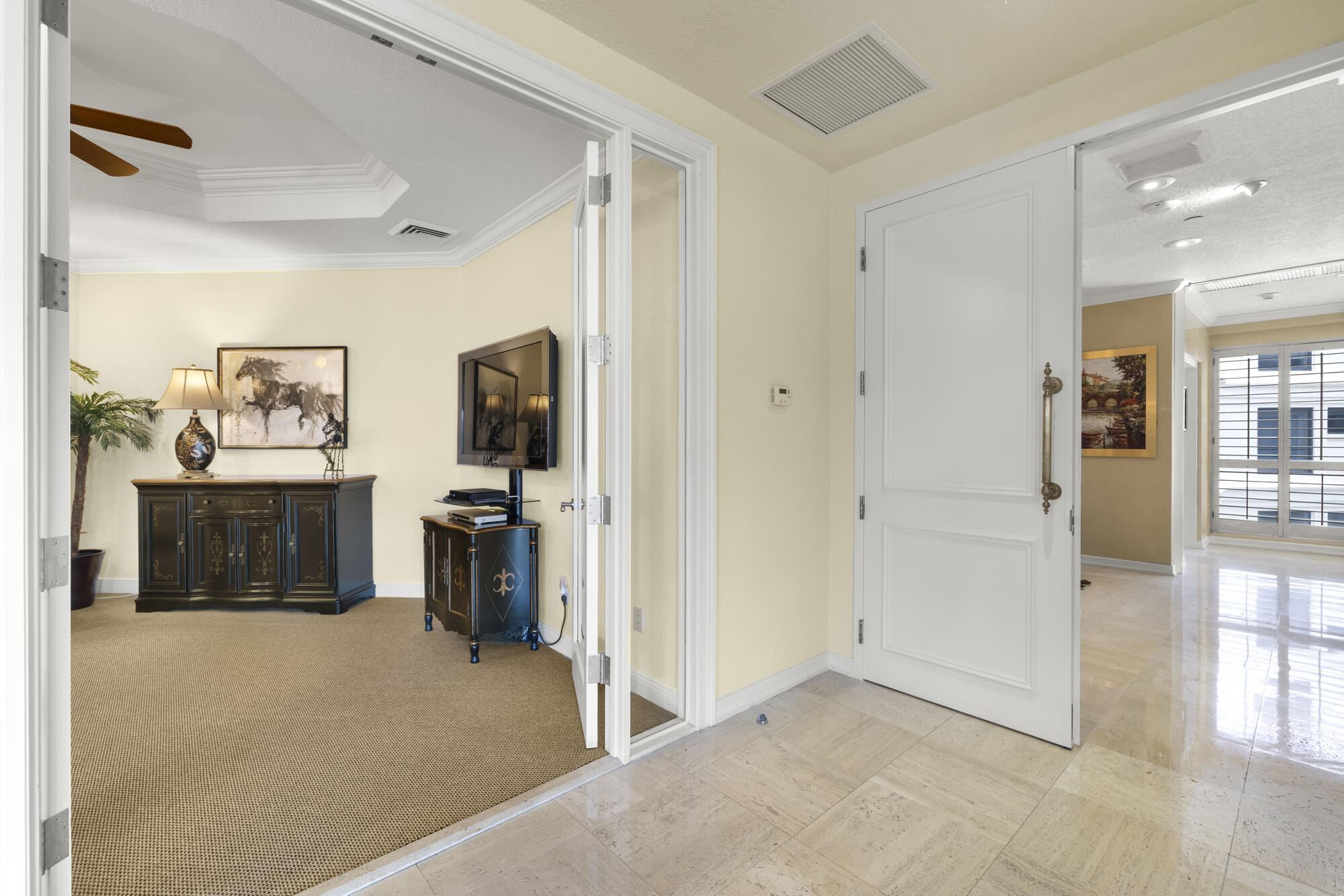 7383 Orangewood Lane, Unit 103 Boca Raton, FL 33433 - Photo 4 of 34 Entry and Den