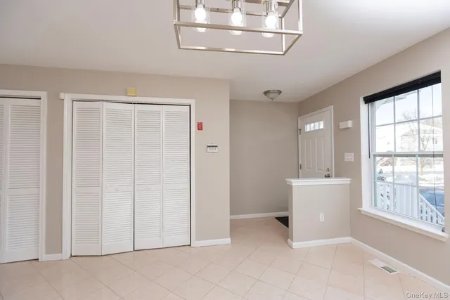 a view of a bathroom with a sink and mirror