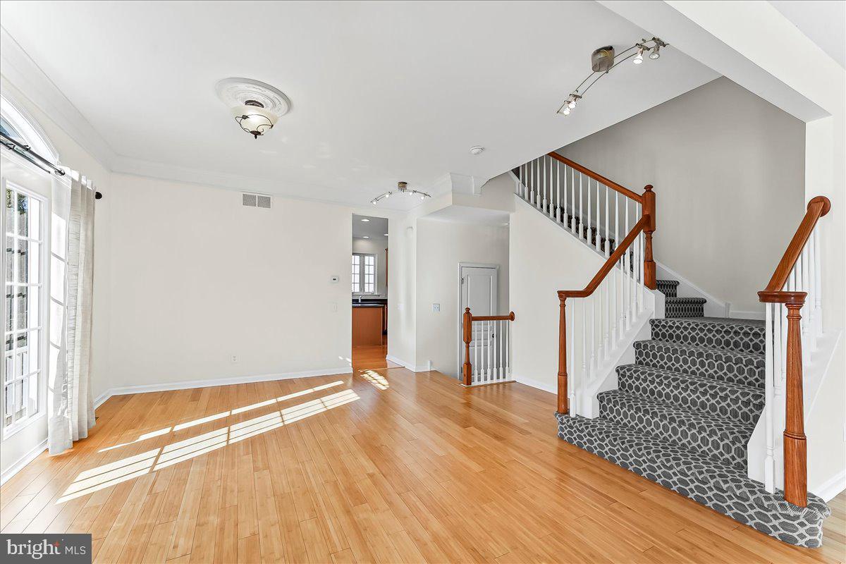 1910 Cavalier Lane Chester Springs, PA 19425 - Photo 14 of 32 a view of empty room with wooden floor