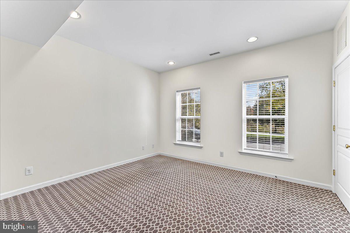 1910 Cavalier Lane Chester Springs, PA 19425 - Photo 5 of 32 a view of an empty room with a window