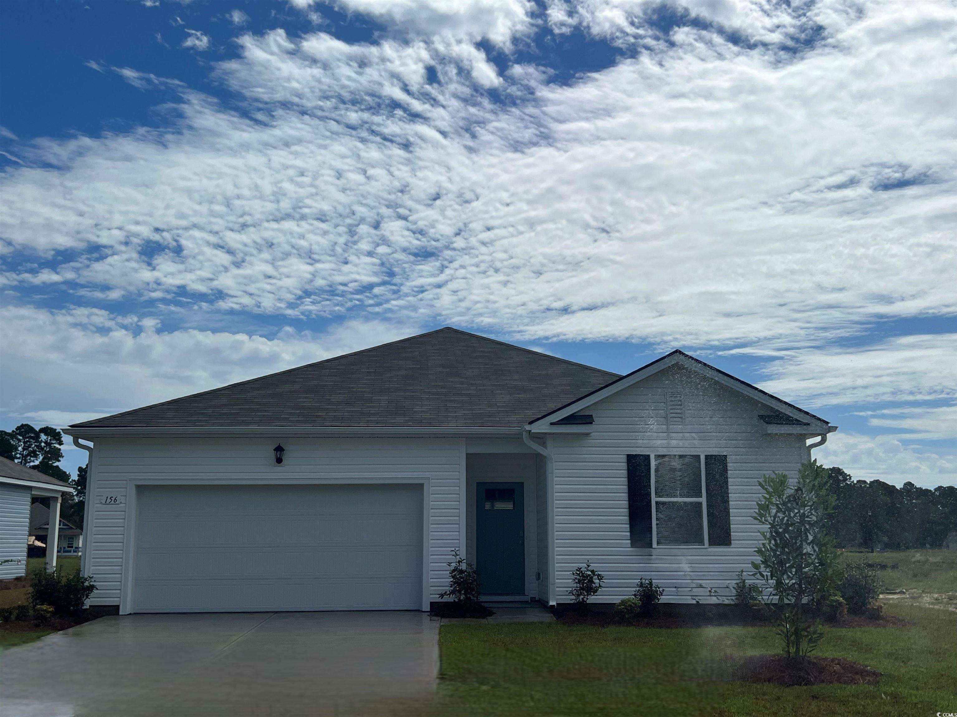 156 Dagger Court Myrtle Beach, SC 29588 - Photo 1 of 20 Ranch-style house featuring an attached garage, driveway, and a shingled roof