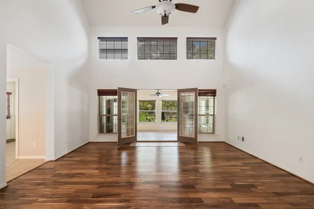 a view of an entryway with wooden floor