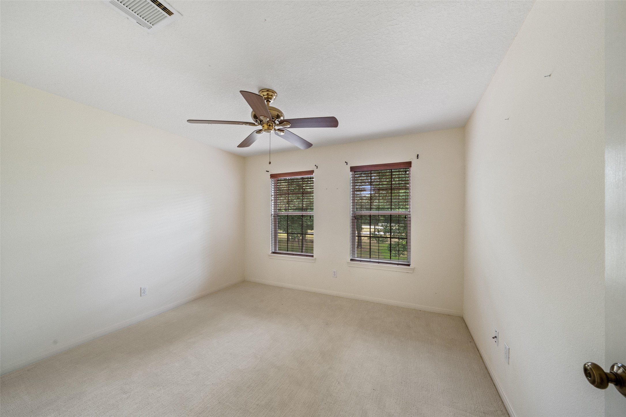 7863 Rodeo Road Waller, TX 77484 - Photo 27 of 36 a view of an empty room with a window