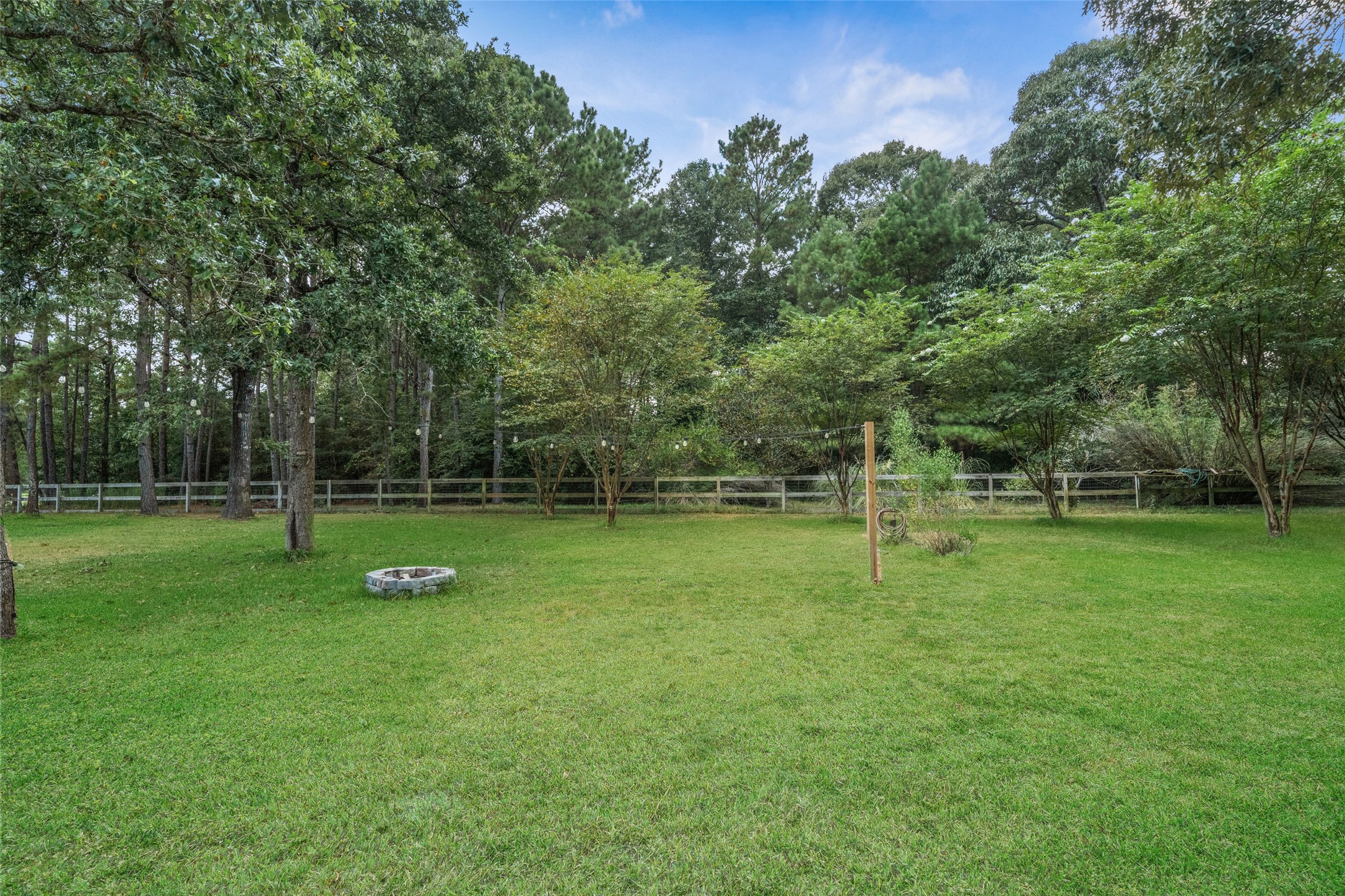 7863 Rodeo Road Waller, TX 77484 - Photo 30 of 36 a view of a park with trees in the background