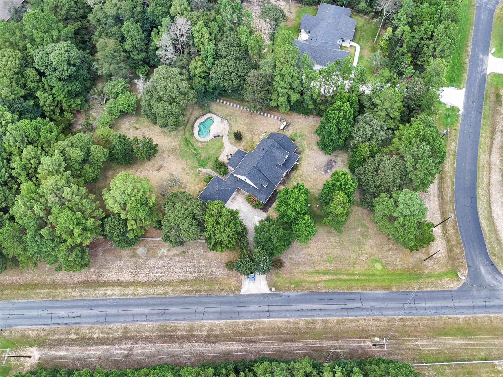 7863 Rodeo Road Waller, TX 77484 - Photo 3 of 36 an aerial view of a house
