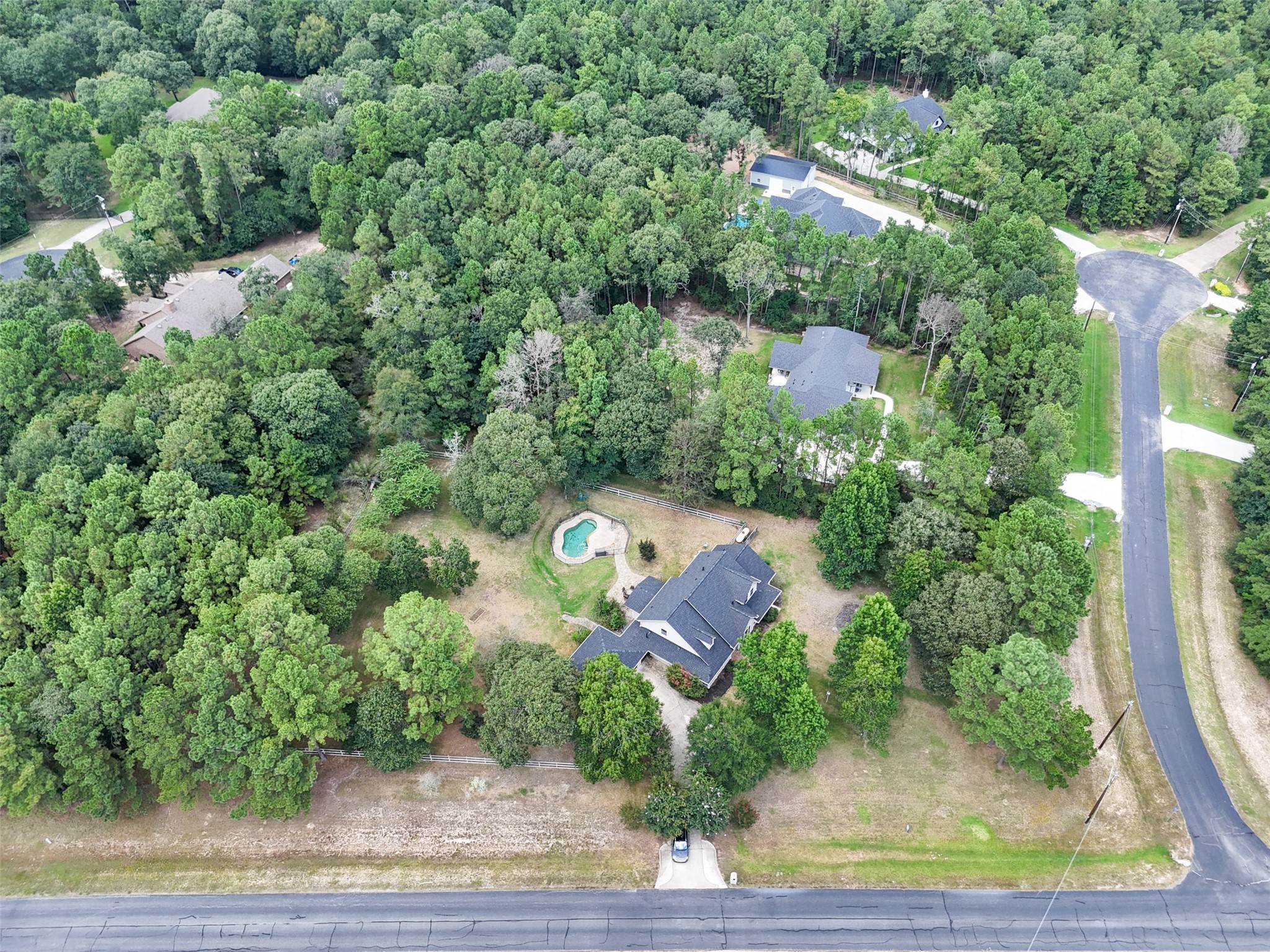 7863 Rodeo Road Waller, TX 77484 - Photo 31 of 36 an aerial view of a house with a yard