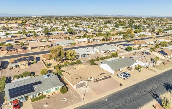 an aerial view of residential building and parking space
