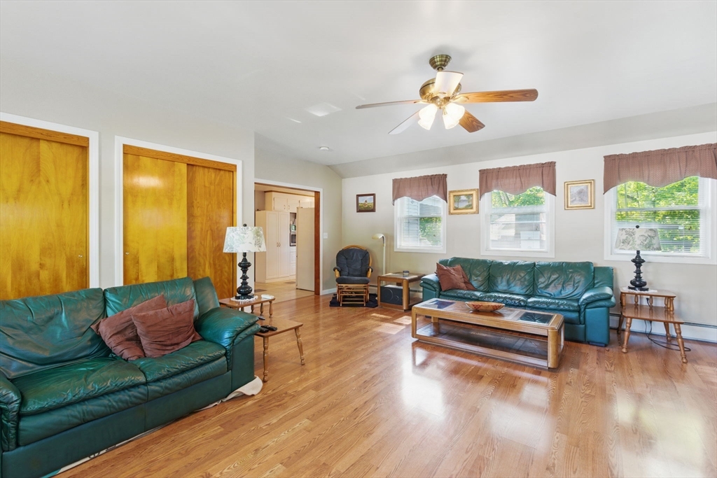 17 Howard Street Enfield, CT 06082 - Photo 5 of 33 a living room with furniture and a wooden floor
