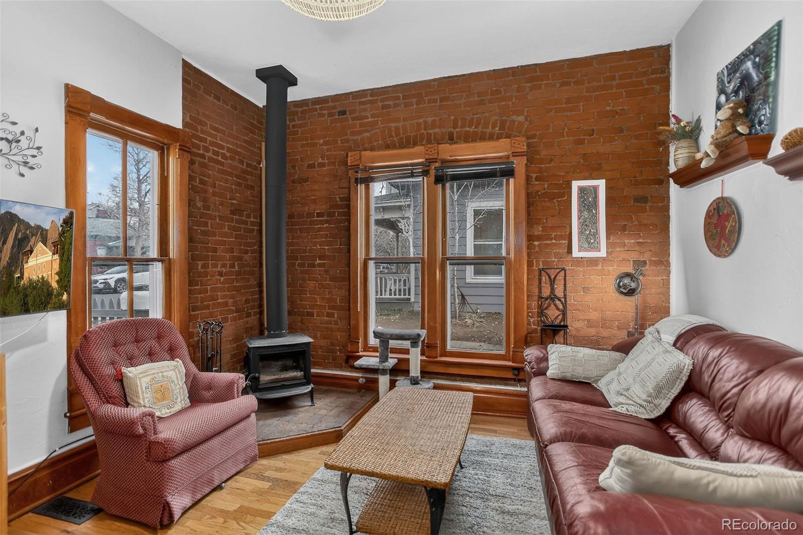 1902 Grove Street Boulder, CO 80302 - Photo 7 of 41 a living room with furniture and a large window