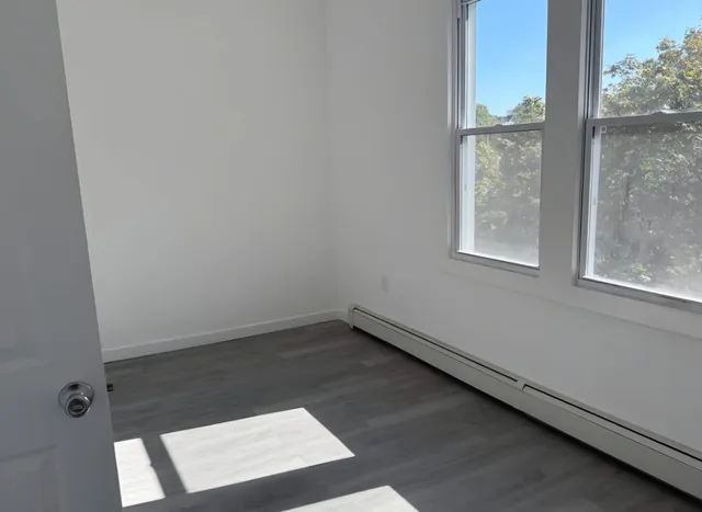 an empty room with a window