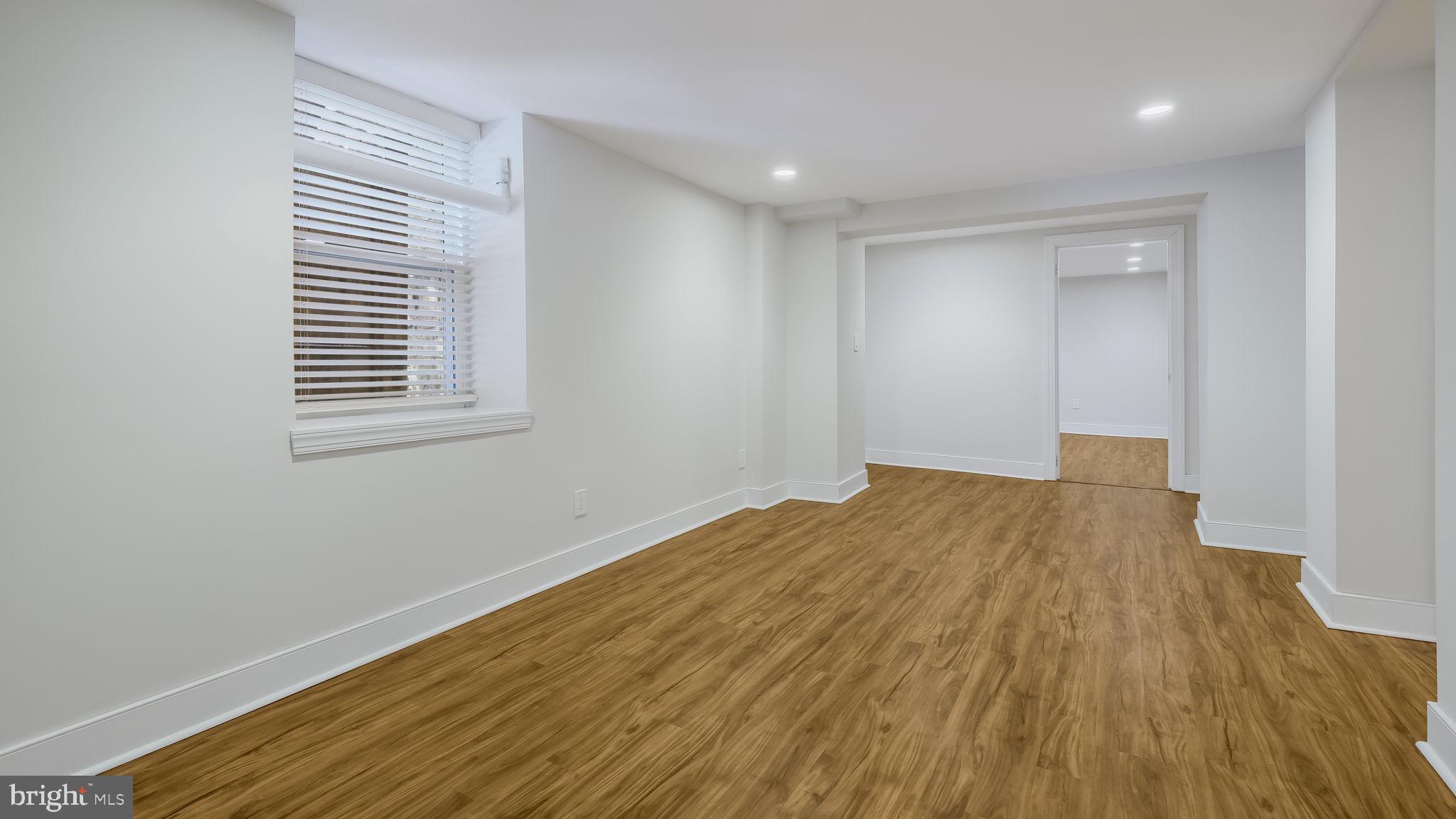 106 East State Street, Unit 4 Doylestown, PA 18901 - Photo 12 of 19 a view of empty room with wooden floor