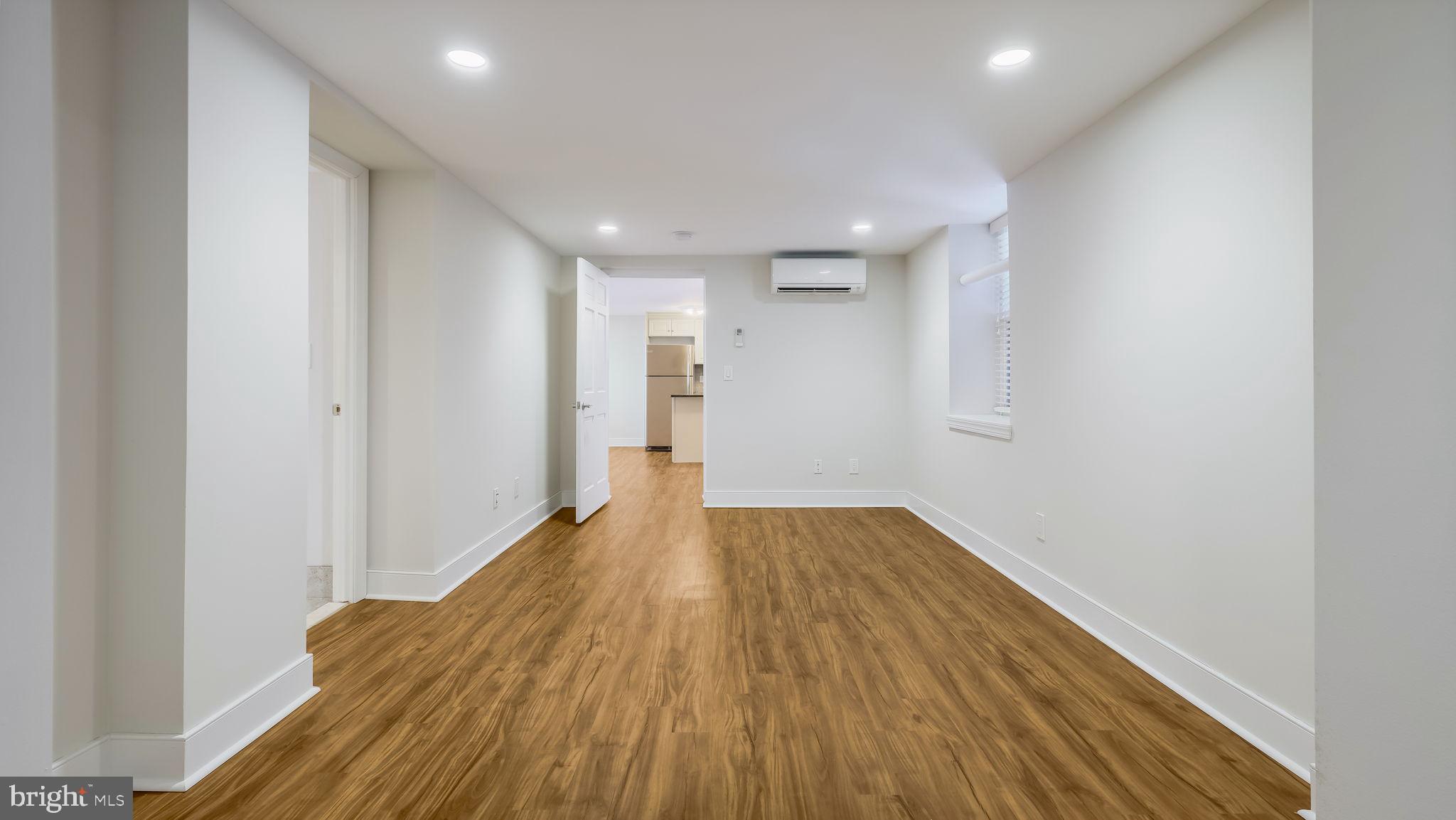 106 East State Street, Unit 4 Doylestown, PA 18901 - Photo 13 of 19 a view of hallway with wooden floor
