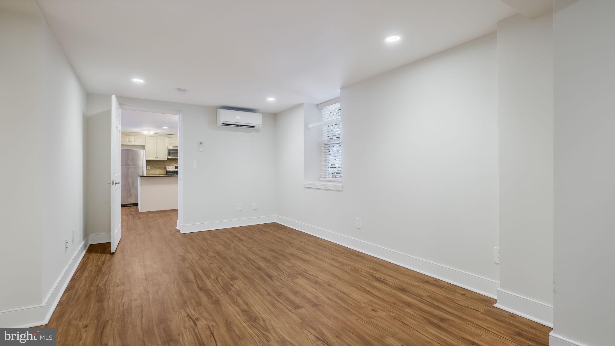106 East State Street, Unit 4 Doylestown, PA 18901 - Photo 14 of 19 a view of empty room with wooden floor