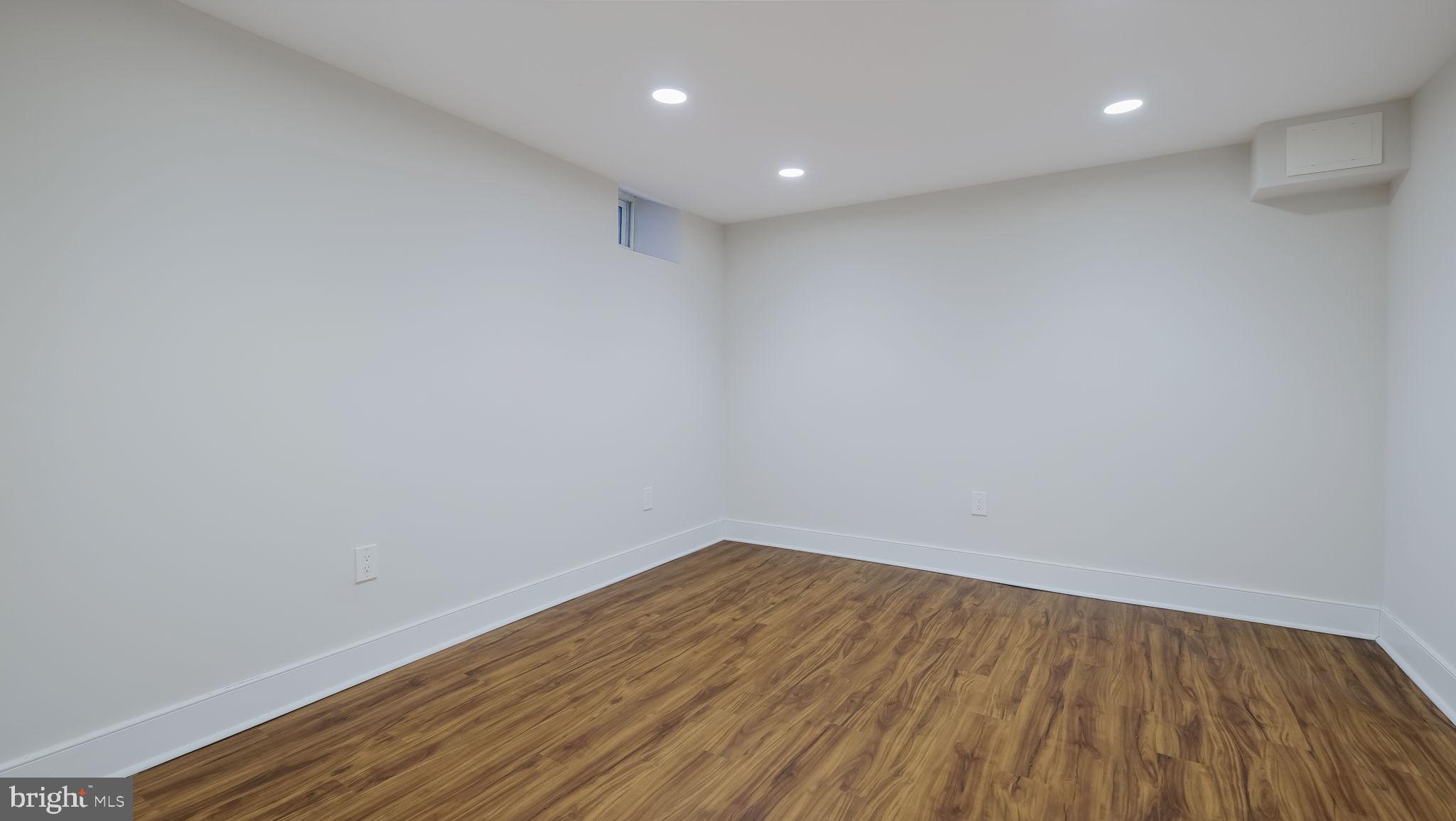 106 East State Street, Unit 4 Doylestown, PA 18901 - Photo 19 of 19 a view of room with wooden floor and fan