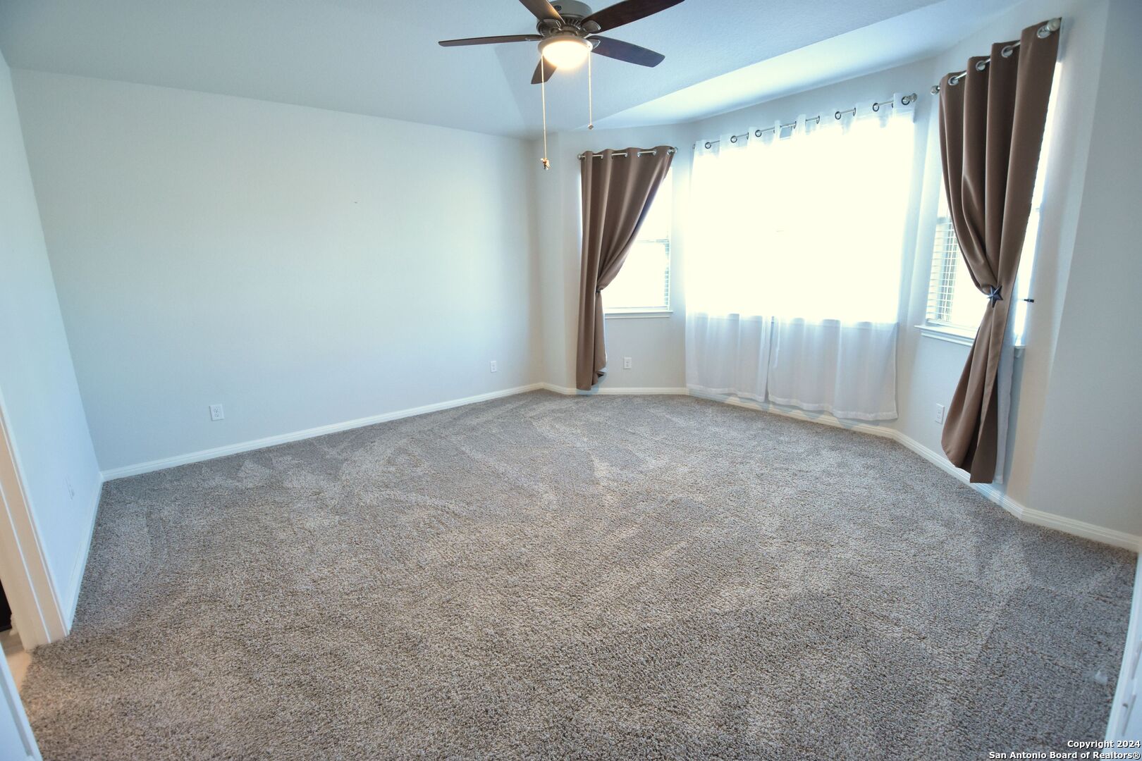 4923 Ranahan Pass St. Hedwig, TX 78152 - Photo 17 of 29 an empty room with a window
