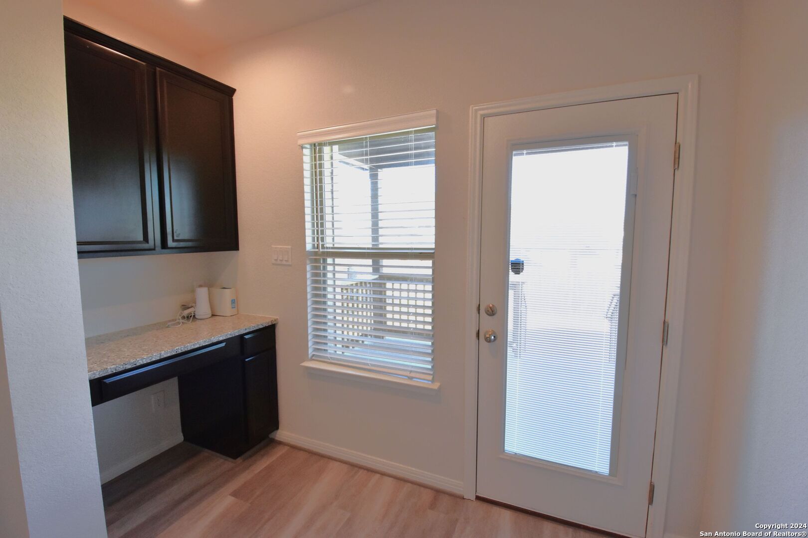 4923 Ranahan Pass St. Hedwig, TX 78152 - Photo 27 of 29 a room with two mirror and a window