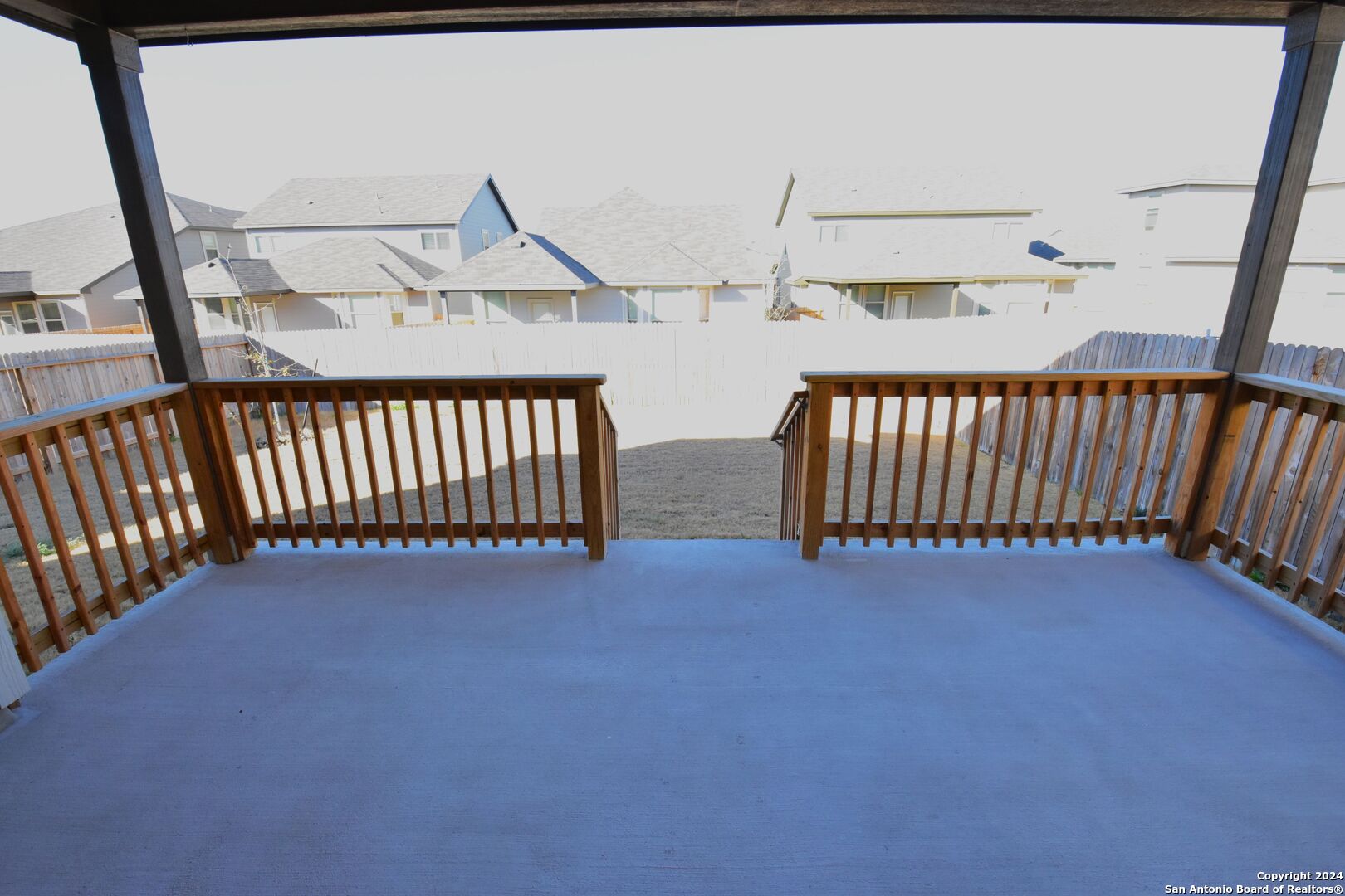 4923 Ranahan Pass St. Hedwig, TX 78152 - Photo 28 of 29 a view of staircase with railing and white walls