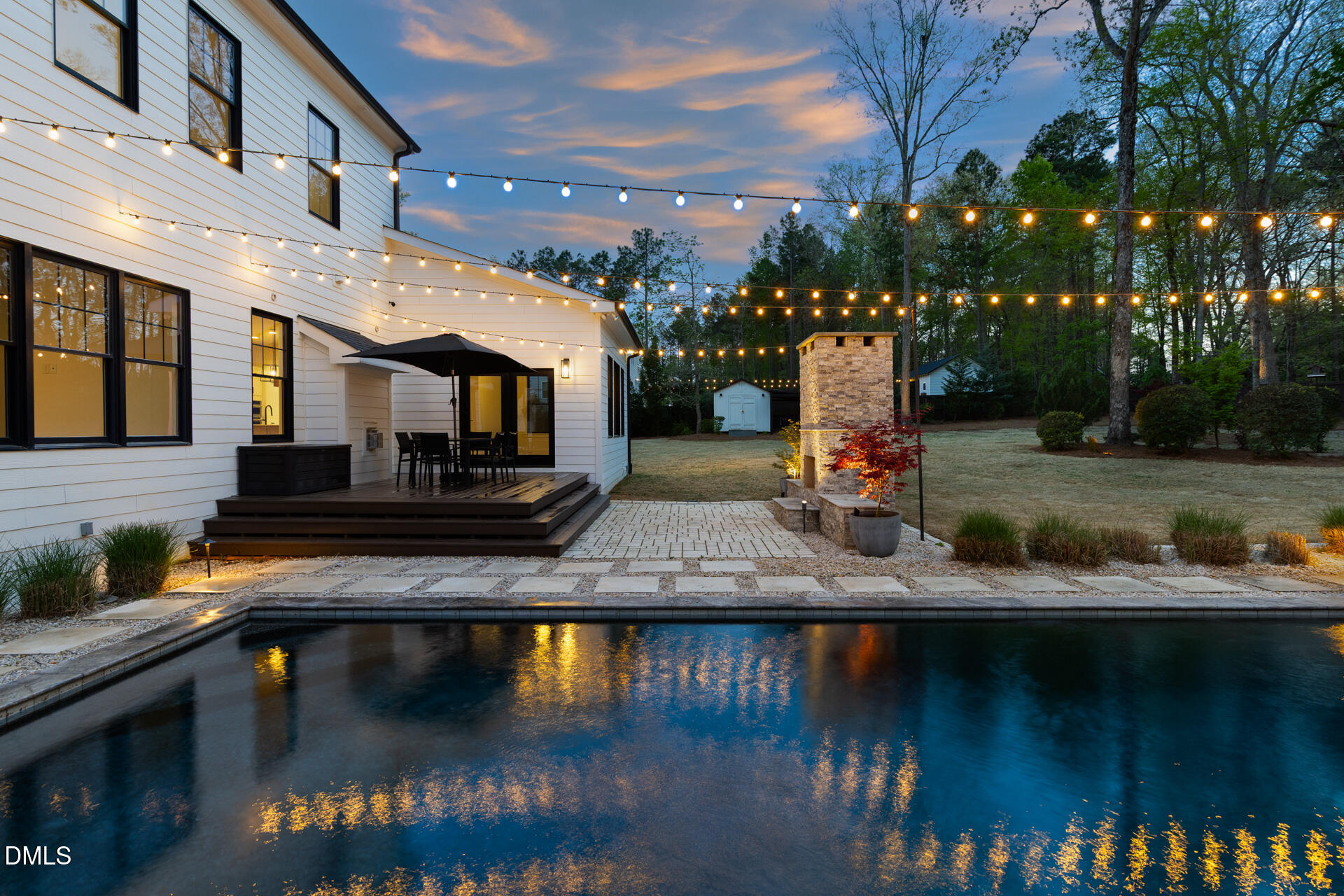 1117 Barley Stone Way Raleigh, NC 27603 - Photo 52 of 59 a view of a lake with a house