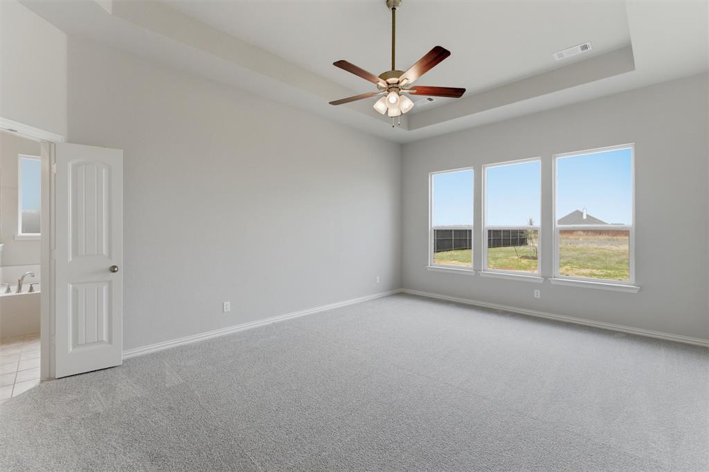 428 Guadalupe Lane Springtown, TX 76082 - Photo 25 of 29 a view of an empty room with a window
