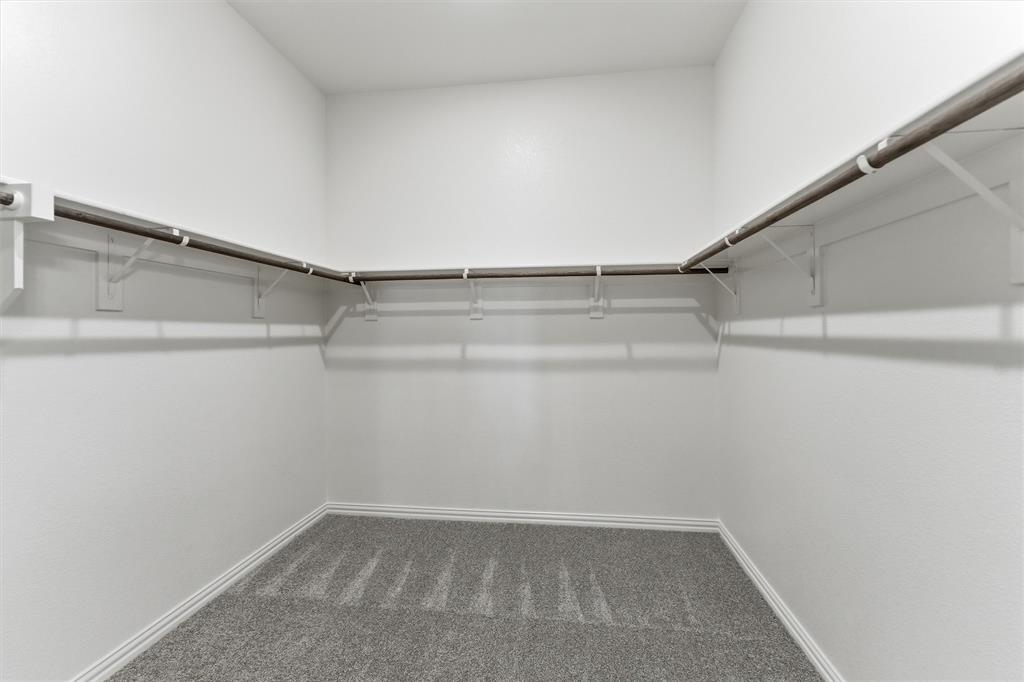 428 Guadalupe Lane Springtown, TX 76082 - Photo 28 of 29 a view of a room with racks on the wall