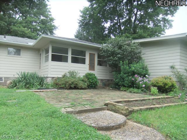 2141 Coon Road Akron, OH 44321 - Photo 14 of 16 Patio area with access to sunroom. What a great place for a family BBQ!